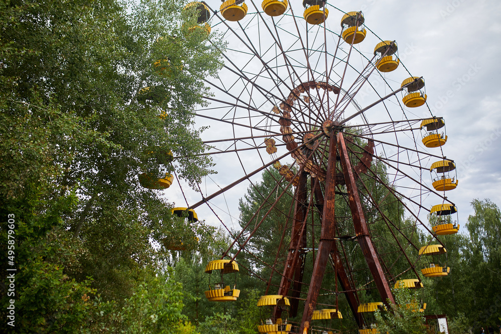 Old abandoned Ferris wheel in the amusement park in the ghost town Pripyat Ukraine. Chernobyl nuclear power plant zone of alienation