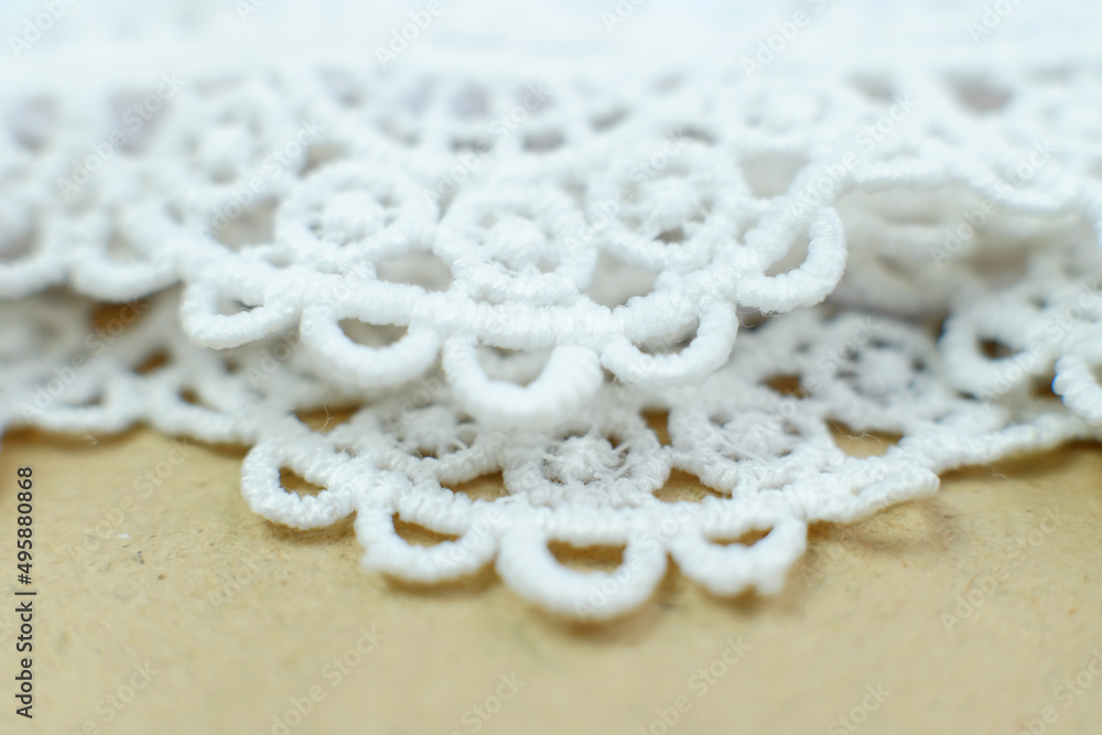 White brocade background, White Prayer hijab brocade detail. Beautiful fabric with fashionable motifs White brocade background, White Prayer hijab brocade detail. Beautiful fabric with fashionable motifs