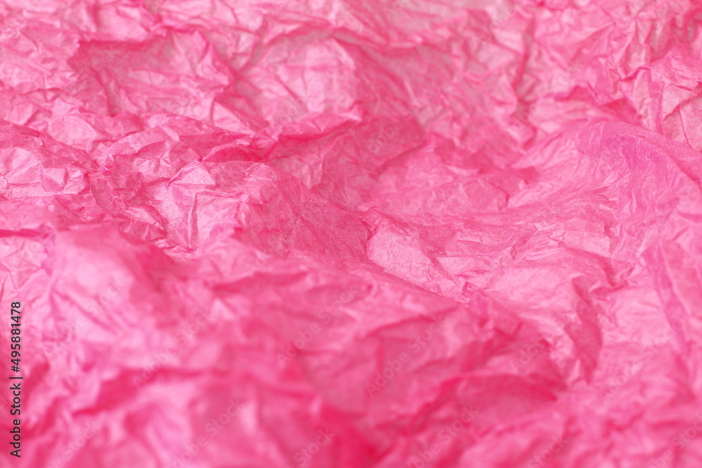 Fototapeta premium Pink wrinkled paper background