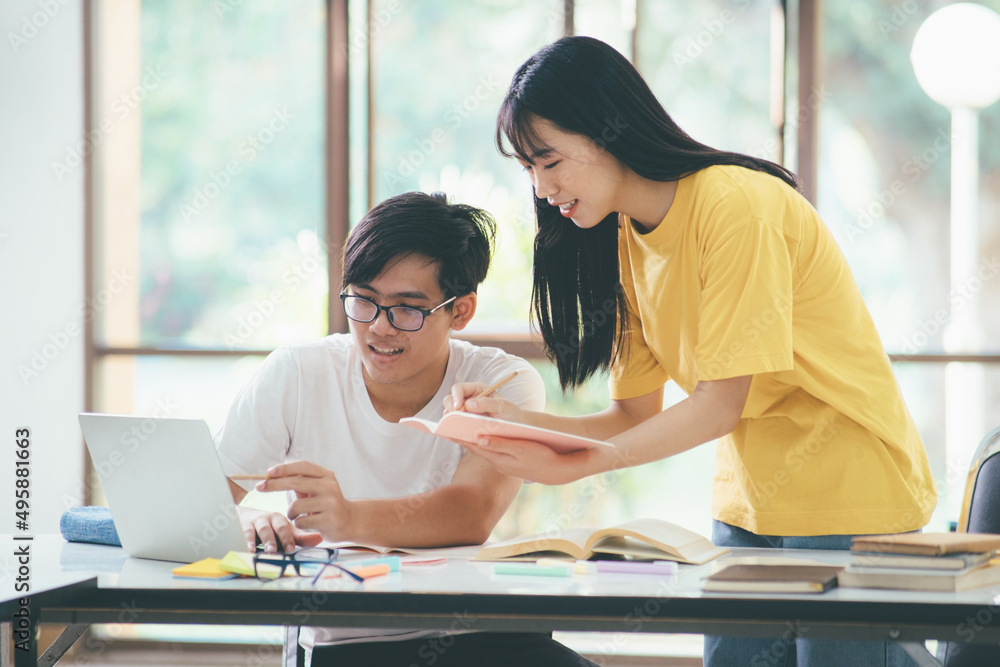 Young students campus helps friend catching up and learning. Young students campus helps friend catching up and learning.