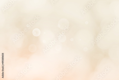 Abstract blurry cream color for background, Bokeh background. Festive defocused white lights blurred.