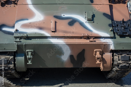 M113 Armored Personnel Carrier APC, Military parade. War weapon, camouflage vehicle, close up.