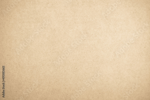 Brown recycled craft paper texture background. Cream cardboard texture vintage. 