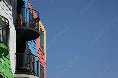 Colerfull building and balcony with clear blye sky, and negative space. 