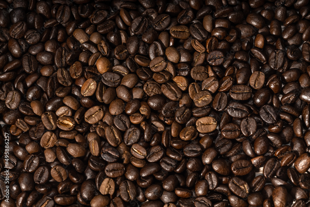 Fototapeta premium Roasted coffee consumers. Coffee objects are laid out on the surface. Food photo background.