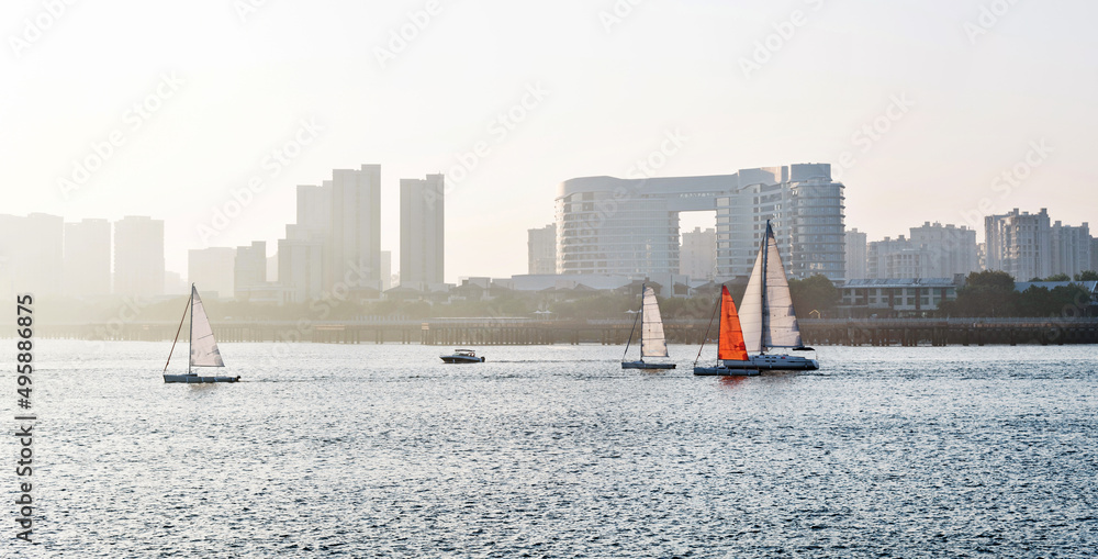 Sailboats in the sea at sunrise Sailboats in the sea at sunrise