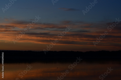 Beautiful sunset reflected in the lake.