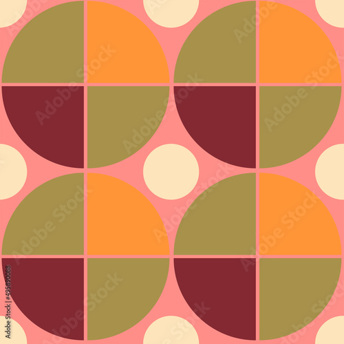 Modern geometric seamless pattern with circle and quadrant shapes. Simple trendy graphic design for print, cover, fabric, wallpaper. Color repeat texture in green, orange, pink tones photo