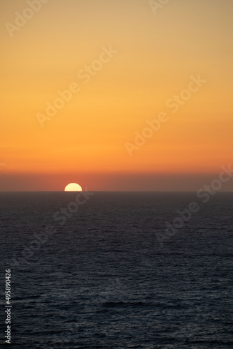 sun disk at sea horizon colorful sunset © phpetrunina14