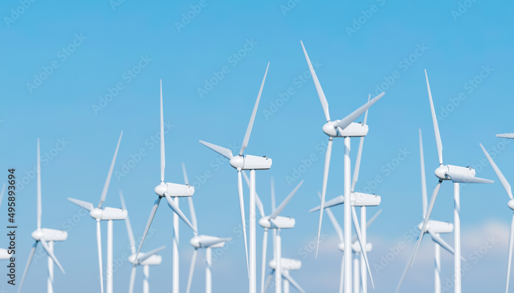 close up of wind turbines with clear sky