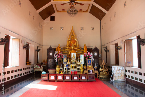 Ancient buddha statue in antique old ubosot for thai people and foreign travelers travel visit and respect praying blessing holy worship at Wat Tanot temple on March 15, 2022 in Nonthaburi, Thailand