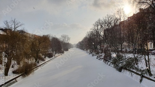 The frozen canal and the sun