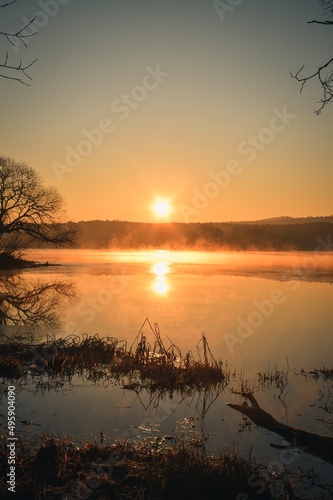 Beautiful morning spring landscape. Sunrise over the lake in Kielce, Poland.