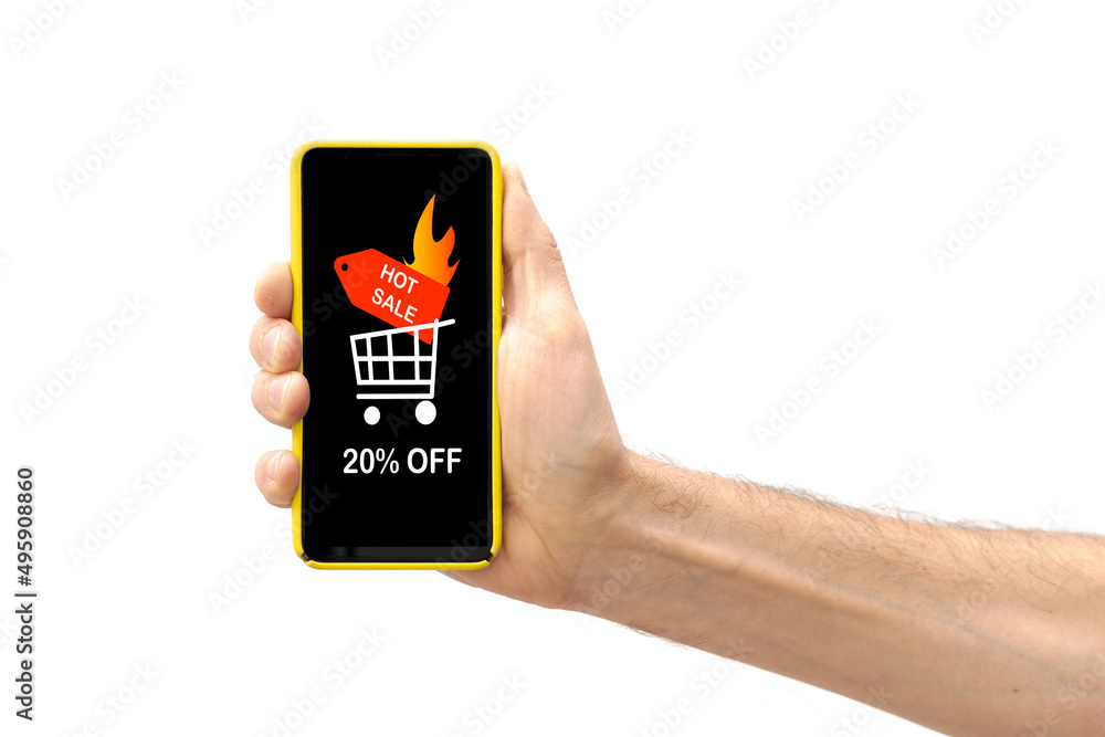 Hand holding a smartphone that on its screen announces a 20 percent discount for the hot sale. Hand holding a smartphone that on its screen announces a 20 percent discount for the hot sale.