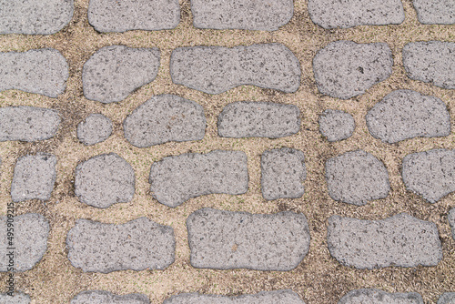 The background of the stone road made of stone.