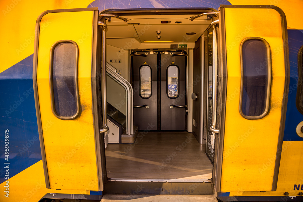 Amsterdam, Netherlands, March 2022. Open and closed doors of a dutch train.
