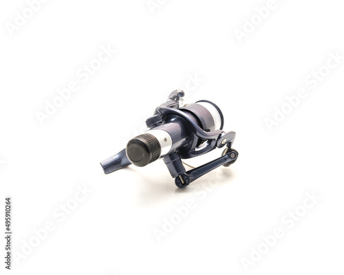Brand new spinning fishing reel with monofilament fishing lines and rear drag system isolated on white background
