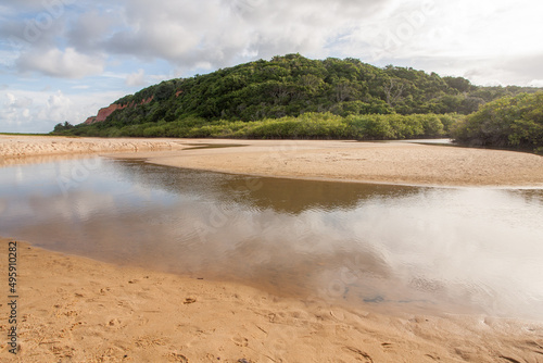 River that flows into Taipe Beach near Arraial d’ Ajuda, Bahia, Brazil photo