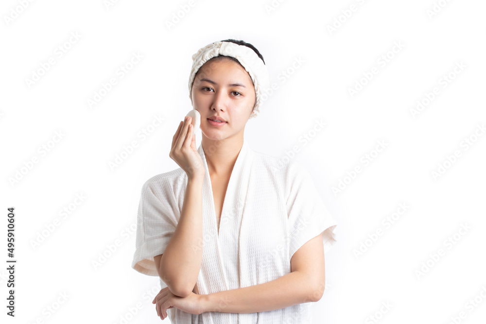 Attractive beautiful natural woman cleaning makeup from her face with cotton pad smile and looking at camera isolated on white background. Skin care and beauty concept. Attractive beautiful natural woman cleaning makeup from her face with cotton pad smile and looking at camera isolated on white background. Skin care and beauty concept.