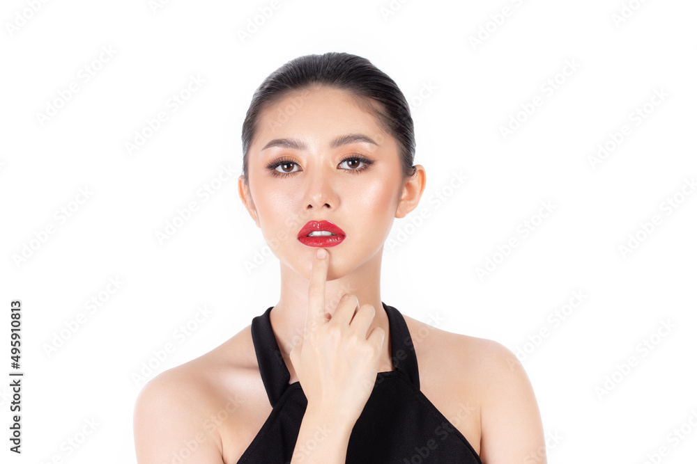 Fashion of a beautiful young asian woman in a pretty black dress and red lips. Fashionable and stylish woman posing isolated on white background. fashion beauty and style. Natural skin makeup. Fashion of a beautiful young asian woman in a pretty black dress and red lips. Fashionable and stylish woman posing isolated on white background. fashion beauty and style. Natural skin makeup.