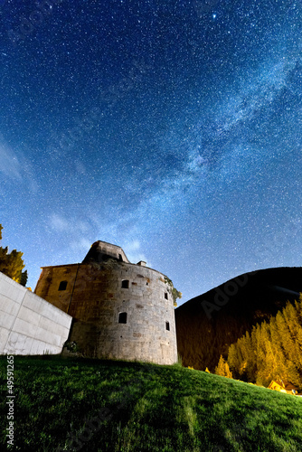 The Milky Way above the Hapsburg Fort of Gomagoi. Stelvio, Bolzano province, Trentino Alto-Adige, Italy, Europe. photo