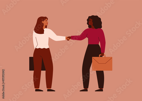 Businesswomen shake hands and look at each other. Young female entrepreneurs made a deal or agreement and will work together on some project. Vector illustration
