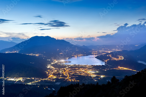 Twilight on the Caldonazzo lake and on the Vigolana plateau. Valsugana, Trento province, Trentino Alto-Adige, Italy, Europe.