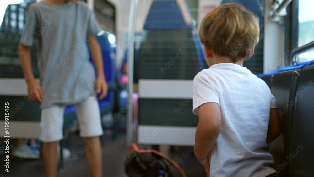 Little boy hurting himself accidentally while playing child hurts mouth while traveling by train Little boy hurting himself accidentally while playing child hurts mouth while traveling by train