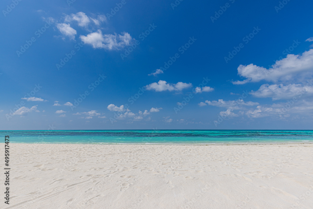 Closeup of sand on beach and blue summer sky. Panoramic beach landscape. Empty tropical beach and seascape. Orange and golden sunset sky, soft sand, calmness, tranquil relaxing sunlight, summer mood

