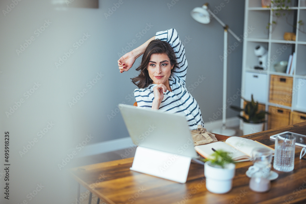 Pretty pretty lady with black hair working at laptop sitting at a table at home - check out online stores selling cyber mondays - tech woman concept for alternative freelance office Pretty pretty lady with black hair working at laptop sitting at a table at home - check out online stores selling cyber mondays - tech woman concept for alternative freelance office