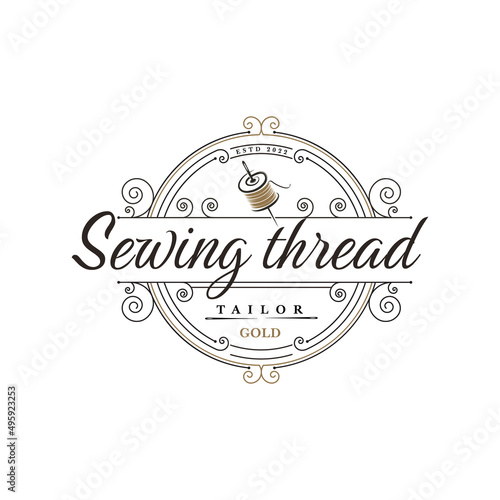 Vector illustration of a vintage logo for a tailor s workshop and a handmade clothing store. design schedule for logo abstract spool with gold thread and needle
