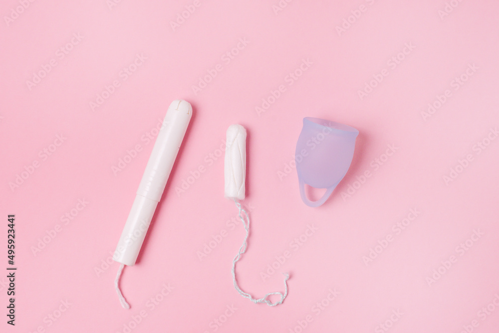 Blue Menstrual Cup on Pink Background Female Intimate Hygiene Period Products Horizontal Blue Menstrual Cup on Pink Background Female Intimate Hygiene Period Products Horizontal