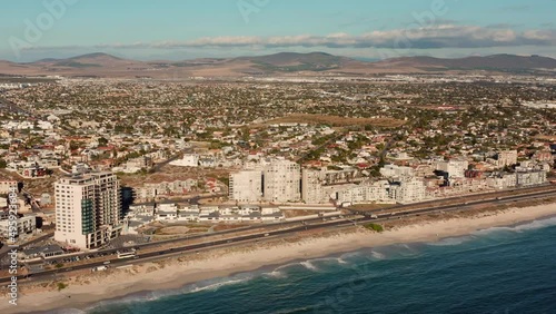 Beachfront Cityscape With Coastal Road At Blouberg Beach In Cape Town, South Africa. Aerial Wide Shot