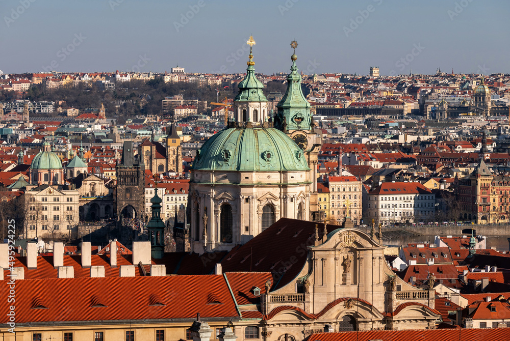 St. Nicholas church and panorama of Prague historical building.