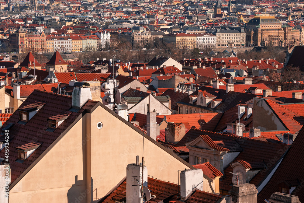 Many picturesque red roof and historical building in Prague.