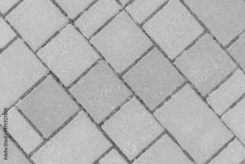 Gray sidewalk tile street stone city road abstract urban pattern design texture paving background