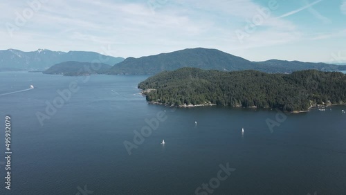 Panoramic view looking over the picturesque Howe Sound from Soames Hill on the Sunshine Coast in Gisbons, Canada. Wide angle aerial panning shot photo