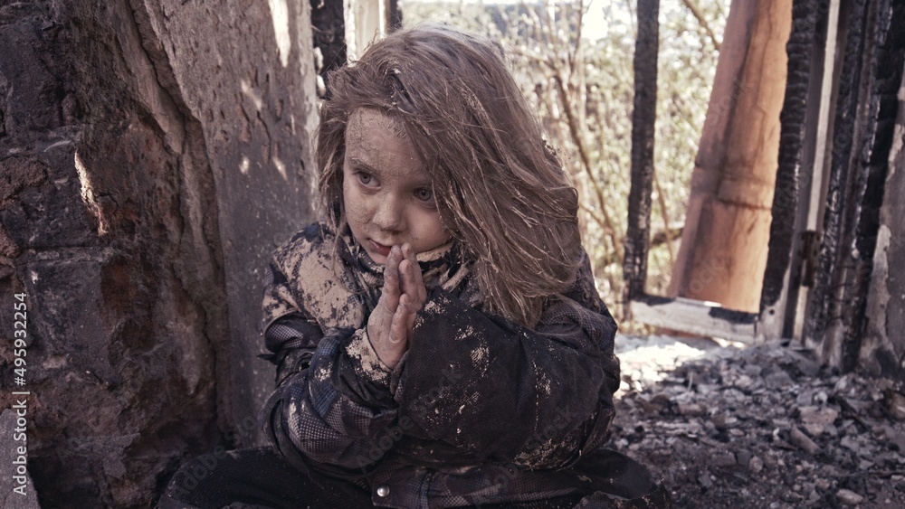 girl praying. Children without a home, apocalypse, war girl praying. Children without a home, apocalypse, war