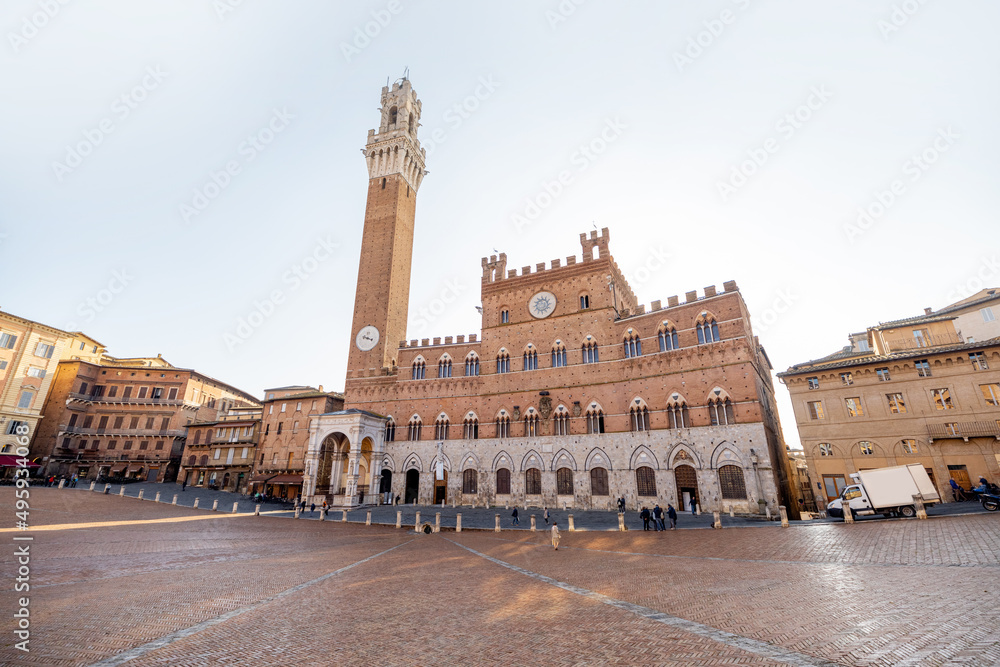 Morning view on the main square of Siena city with town hall. Concept of architecture of the Tuscan region and travel Italy