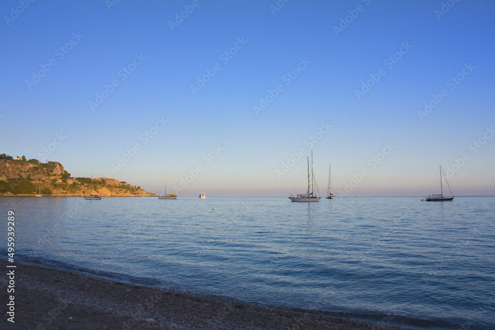 Wonderful view of seaside at sunset in Taormina, Sicily, Italy Wonderful view of seaside at sunset in Taormina, Sicily, Italy
