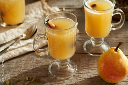 Hot pear drink with fresh pears and cinnamon