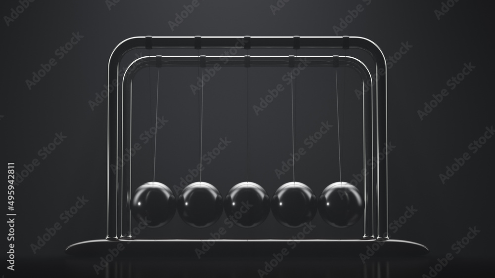 Newton's pendulum is stationary. Dark background Newton's pendulum is stationary. Dark background