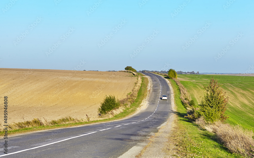 photo of the road passing through the fields in Ukraine