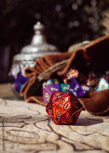 Vertical image of a red 20 sided die