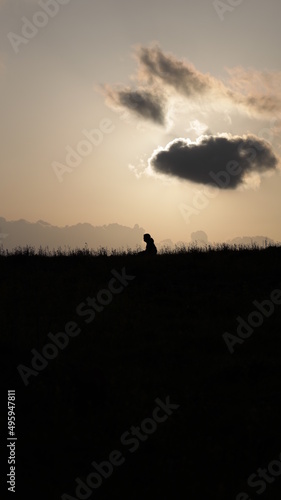 silhouette of a person on a sunset