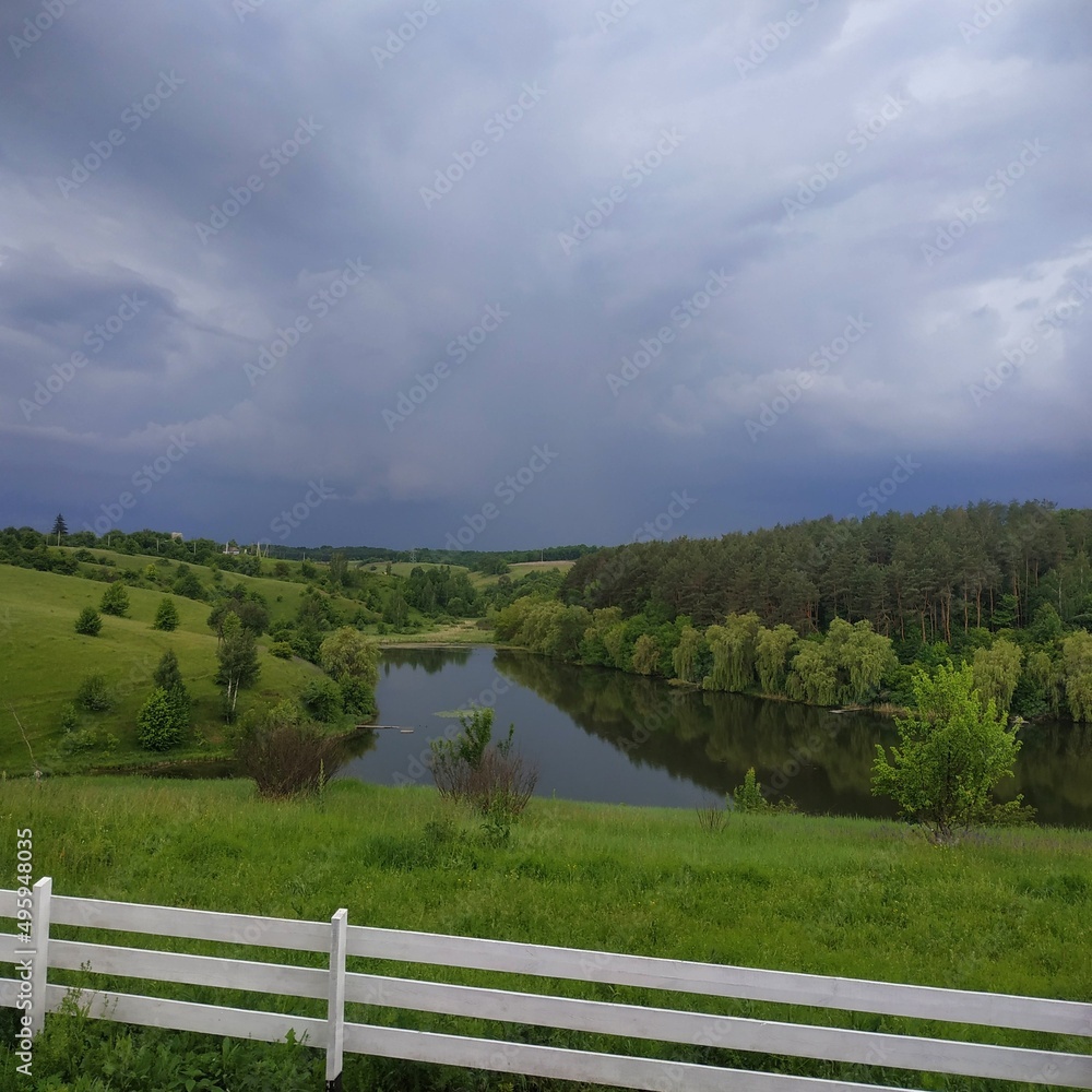 landscape with fence and sky landscape with fence and sky