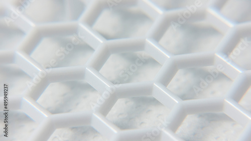 Detalle de cuadrícula de celdas hexagonales en rejilla de plástico blanco photo