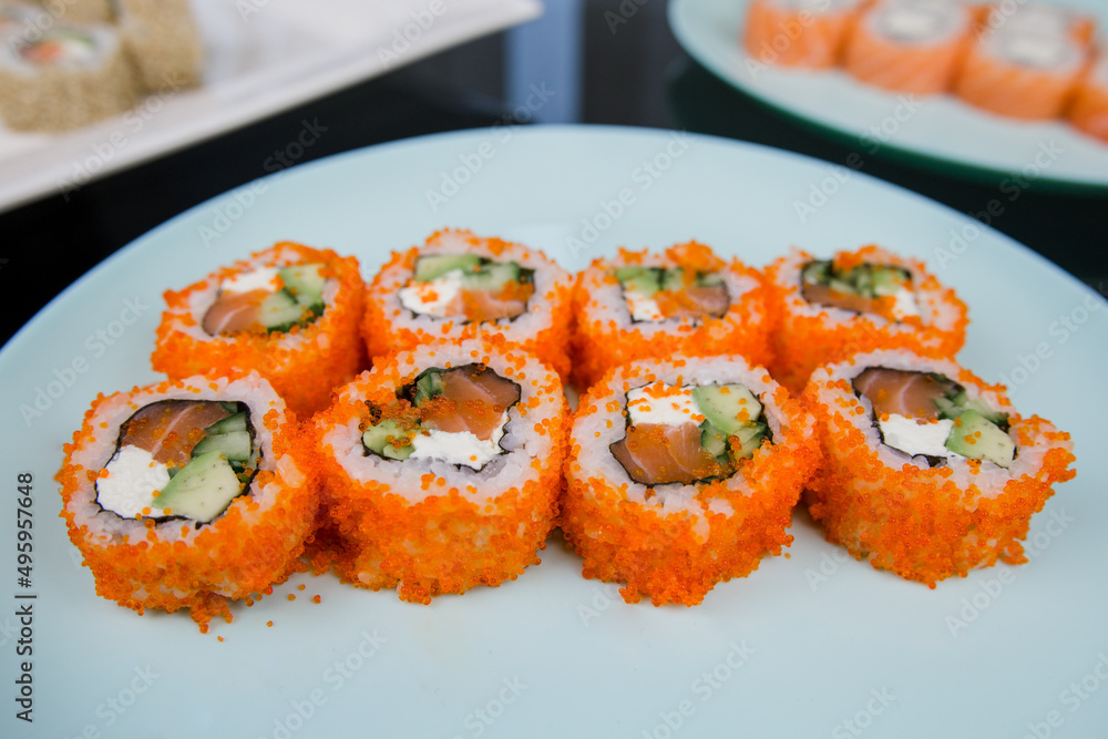 Japanese roll with tuna and white rice in tobiko caviar