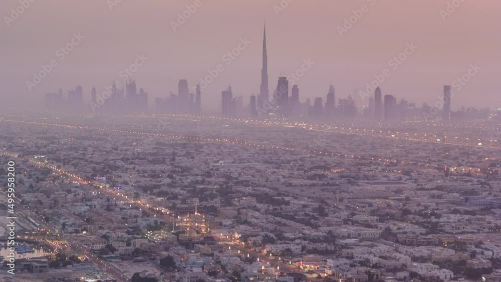 Skyline view of Dubai from night to day transition, UAE. Timelapse Skyline view of Dubai from night to day transition, UAE. Timelapse