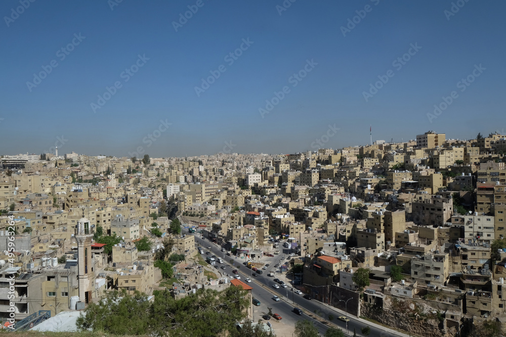 Amman skyline modern buildings traffic on the street capital city of Jordan
